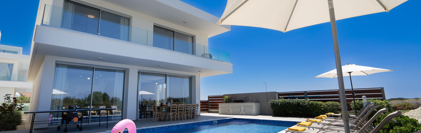 Elegant poolside wedding reception setup at Sea Point Villas in Coral Bay 