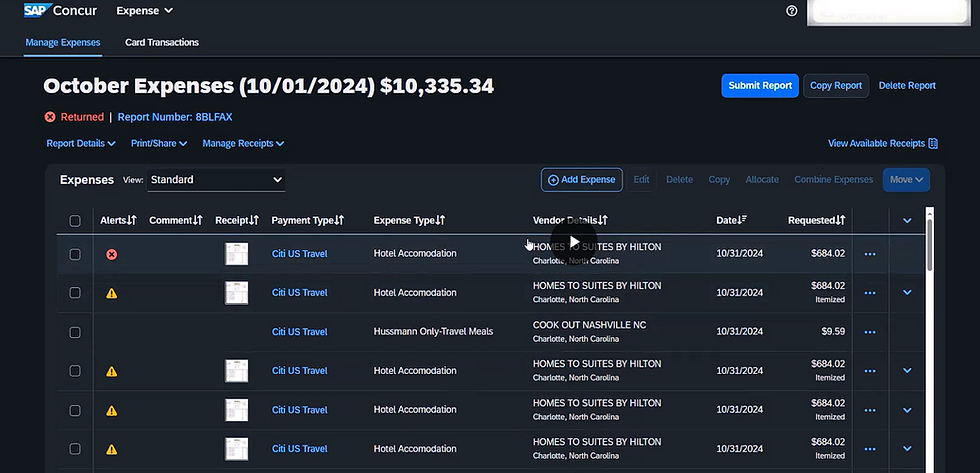 High angle view of a laptop screen showing a video tutorial on expense approval