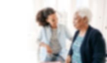 African American Elderly Mother and Daughter Speaking