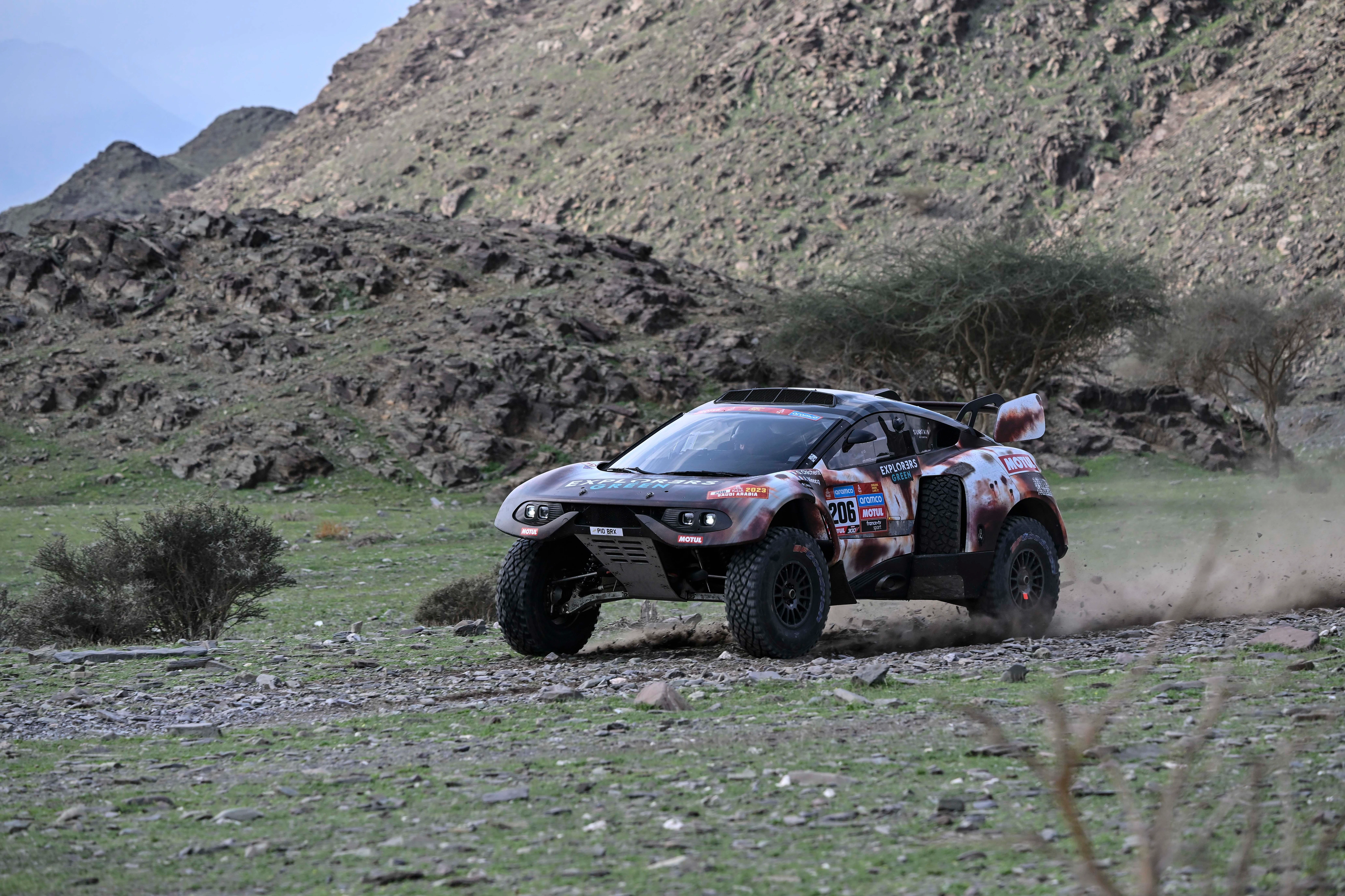 Guerlain Chicherit  drives his Prodrive Hunter left to right along a rocky track on his way to winning stage 3 of the 2023 Dakar Rally