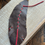 Thumbnail: Brown and Red Leather Feather Charm