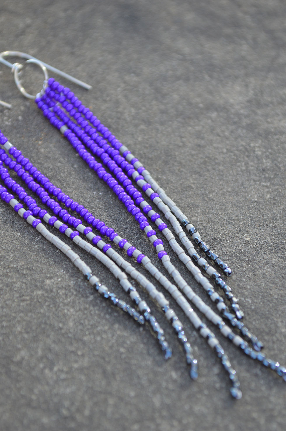 Thumbnail: Wispy Panther Beaded fringe