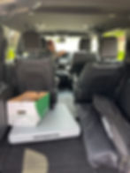 HFC Dental Program Assistant Melissa Valencia loads the van for a community outreach visit.