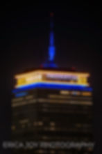 A photograph of the Prudential Center lit up on the 10th anniversary of the Boston Bombing with the slogan Boston Strong