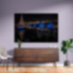 Longfellow bridge in Boston with an MIT sailboat lit up for the holidays