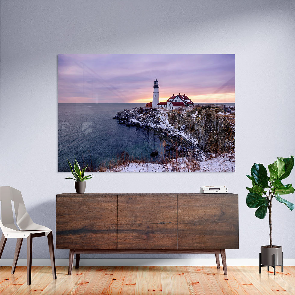 Sunrise at Portland Head Light during snowfall