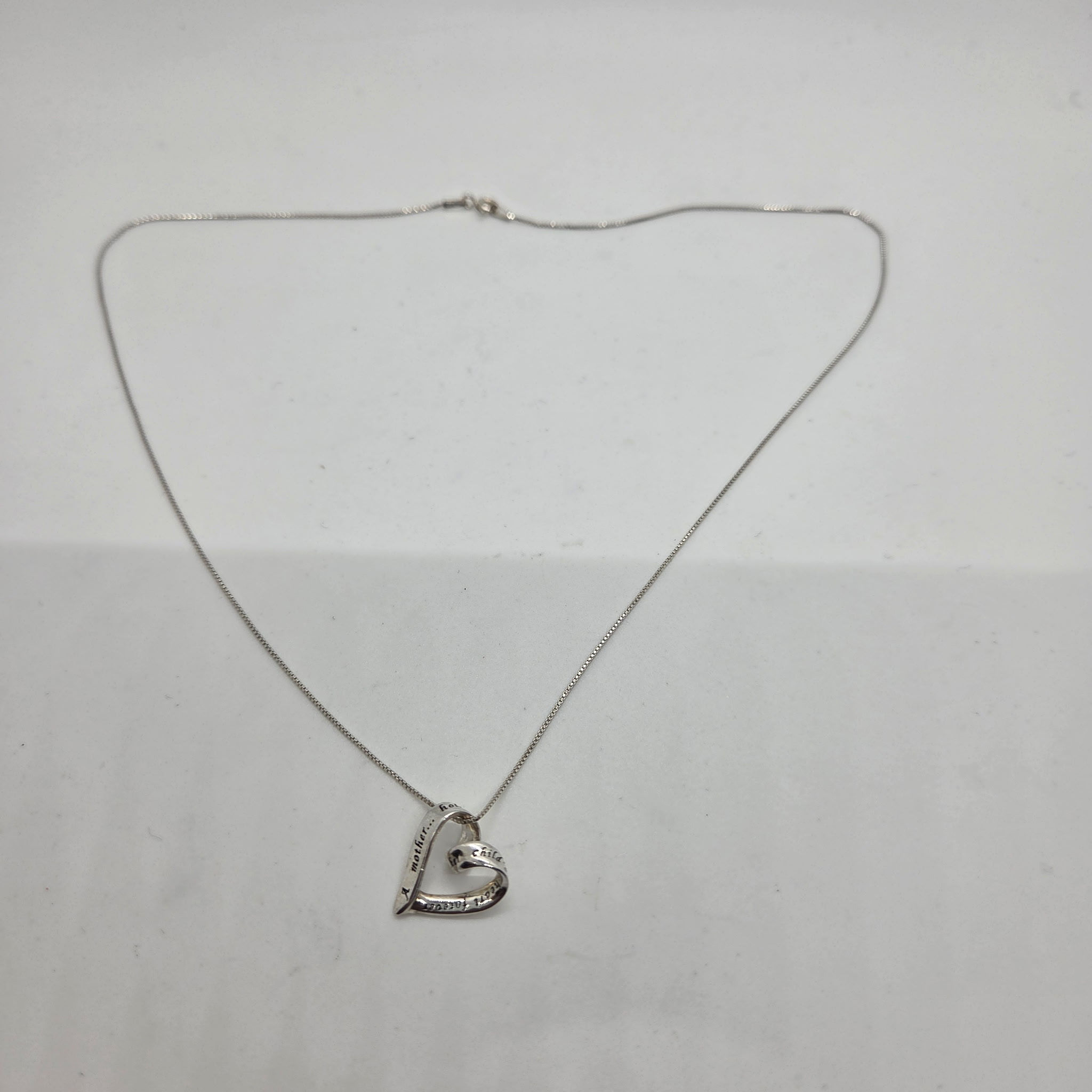 Sterling Silver "A Mother Holds..." Engraved Heart Charm Necklace