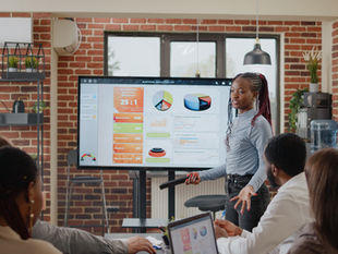 a businessperson at a business presentation