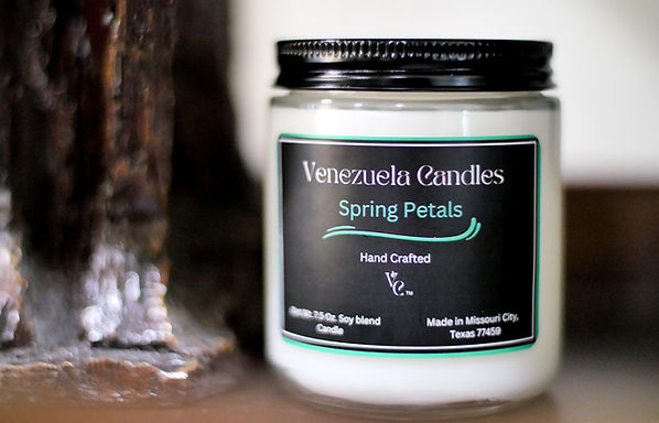 Glass spring petals container  next to glazed petrified wood 