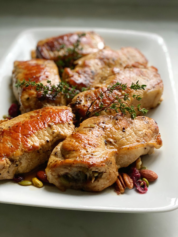 CranberryWalnut Stuffed Pork Chops with Apple Cider Pan Sauce