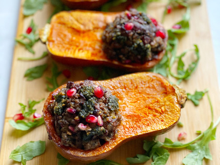 Stuffed Honeynut Squash with Lamb, Dates & Carrot Top Pesto