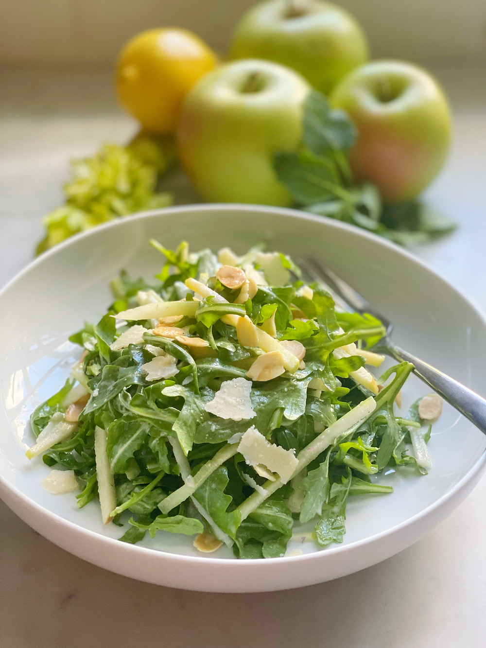Salad of Baby Arugula, Parmesan, Apples, Celery & Toasted Almonds in a Lemon Vinaigrette