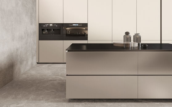 Taupe-grey kitchen cabinet fronts and black island countertop
