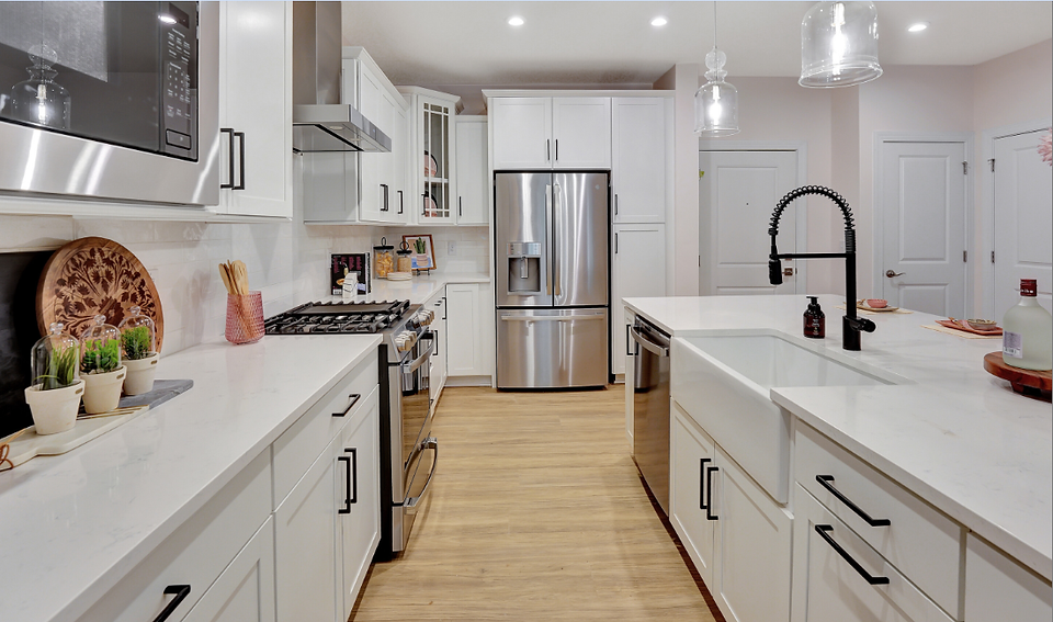 a kitchen with new appliances