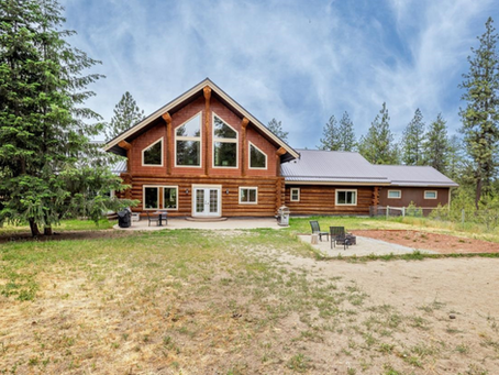 Your Dream Log Home Awaits: A Masterpiece of Rustic Luxury in Nine Mile Falls