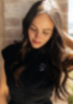 Confident woman with glowing skin representing the results of professional aesthetic care.