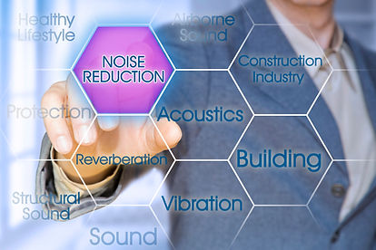 A man pointing at a screen of acoustic servcies including noise reduction, acoustics, building, vibration, airborne sound and construction industry