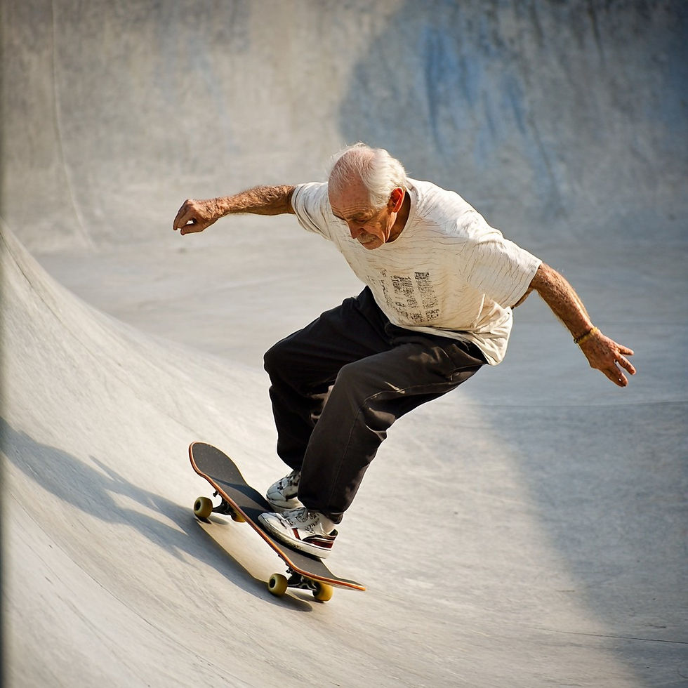 Elderly man skateboarding in a concrete skatepark, wearing a white shirt and black pants, displaying focus and skill.