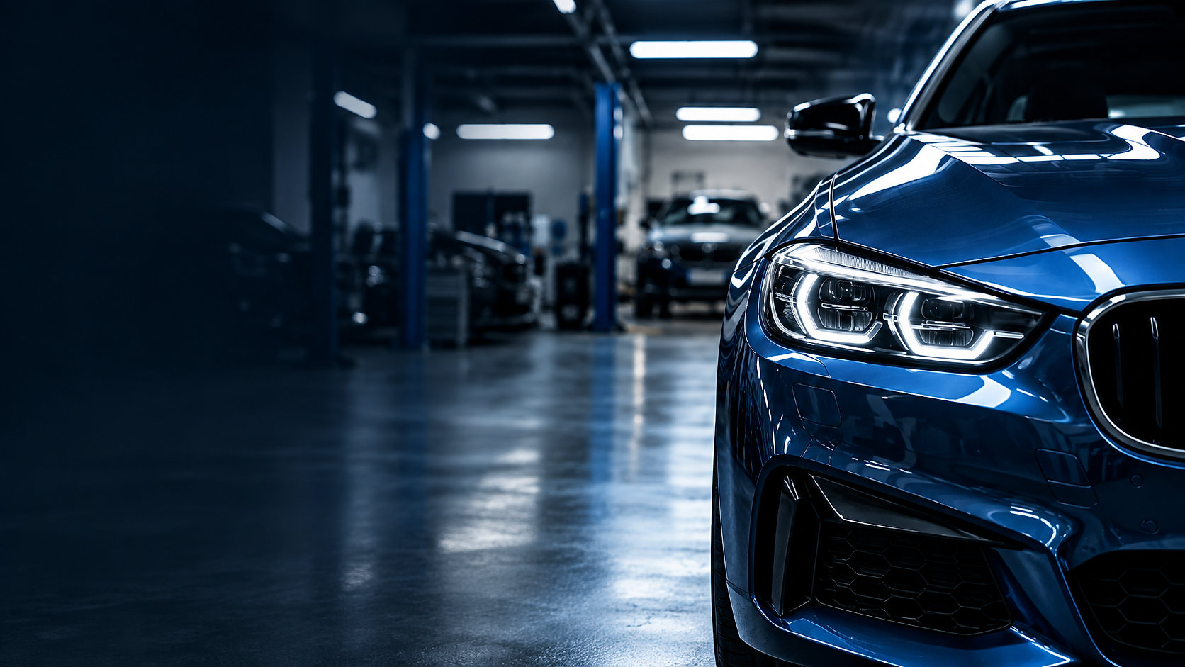 Blue BMW inside the garage workshop