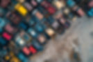vecteezy_junkyard-workers-organizing-damaged-vehicles-for-recycling_65633602.jpg