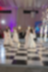Elegant dance performance in traditional attire.png