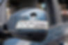 vecteezy_close-up-broken-left-side-rearview-mirror-of-a-car-in-blue_8280692.jpg