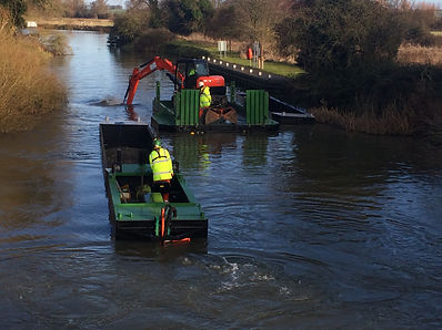 Waterway Dredging - Wide beam digger pontoon with excavation