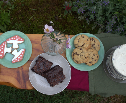 A spread of the Flour Forests offerings, cookies, brownies, and cake