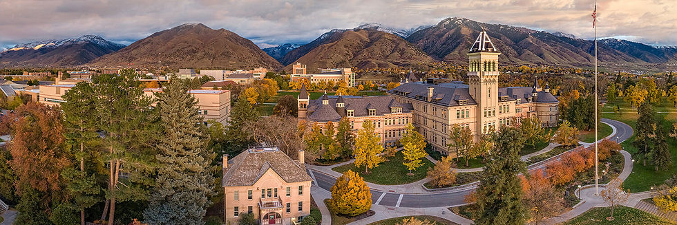 Utah State University campus in Logan, Utah with students walking