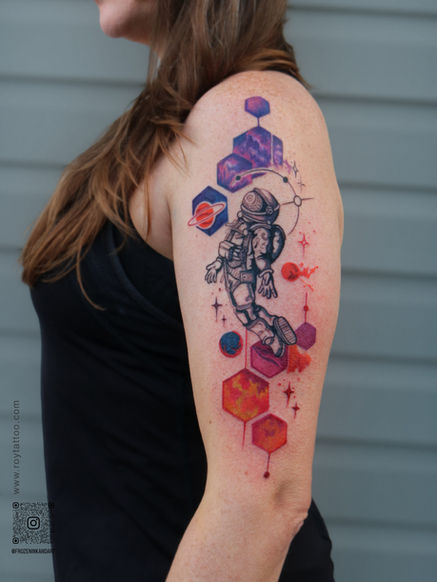 ASTRONAUT WITH UNIVERSE  BACKGROUND TATTOO IN COLOR REALISM DONE BY SUSHMITA ROY, A HALIFAX BASED TATTOO ARTIST 
