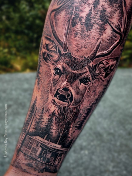 Black and grey realism forest deer Tattoo by Sushmita aka Krishna Roy at Classique ink Tattoo Company Halifax Nova Scotia