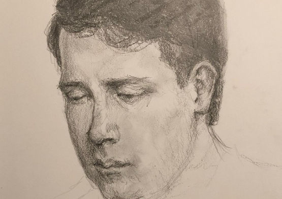 a drawing of a man 's face with his eyes closed