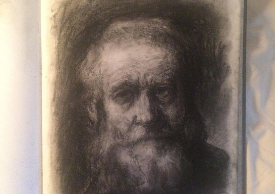 a black and white drawing of a man with a beard