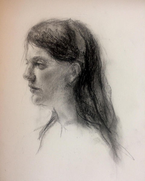a charcoal drawing of a woman with long hair