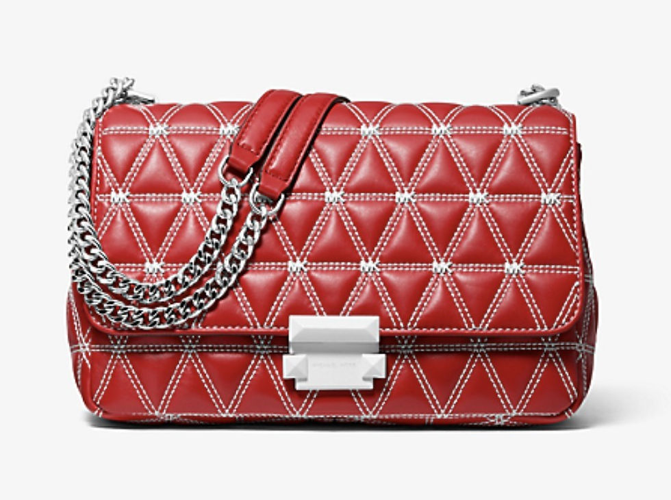 Michael Kors Quilted Convertible Shoulder Bag – angled view with flap closed, chain doubled, and MK clasp visible