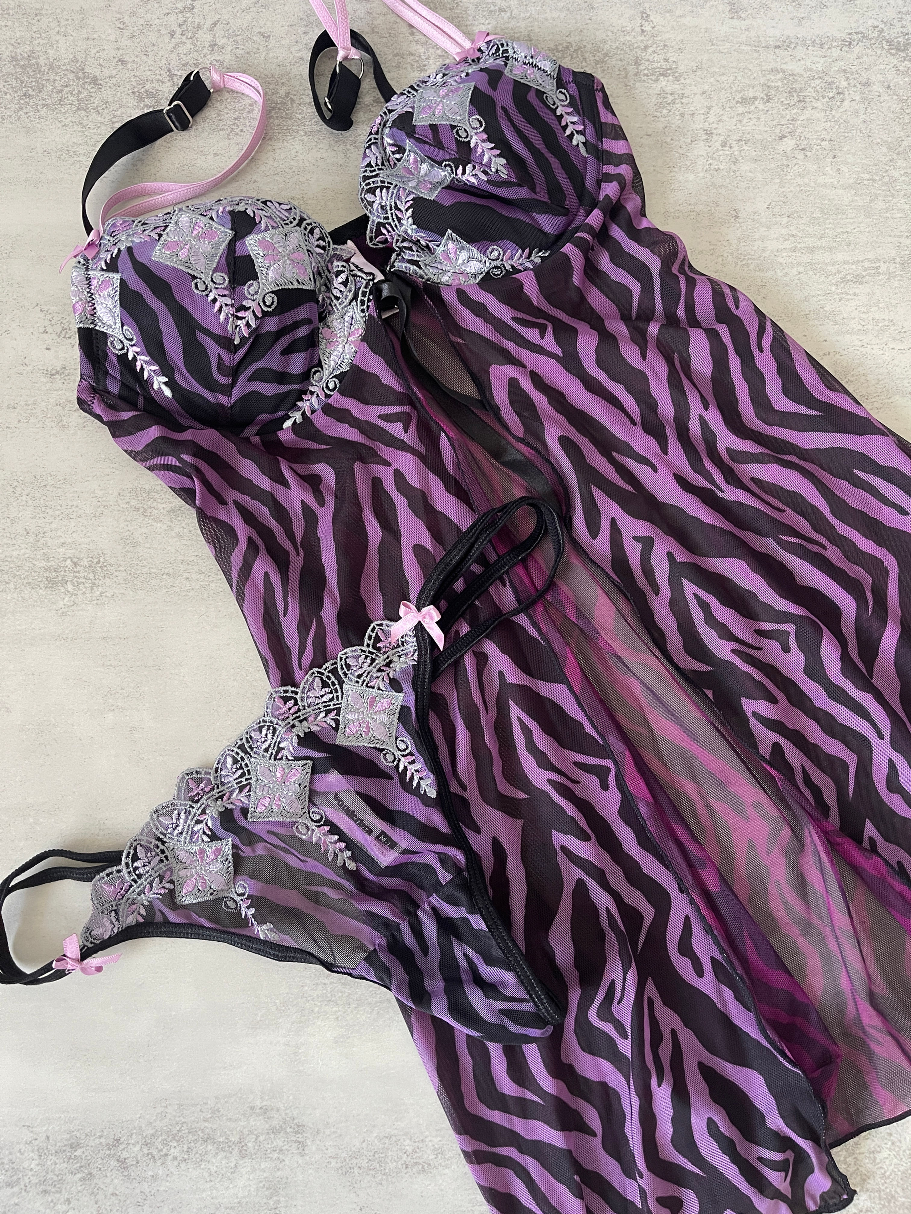 WonderBra Sheer Lingerie Set – full set flat lay with purple zebra print babydoll and matching lace-trimmed thong.