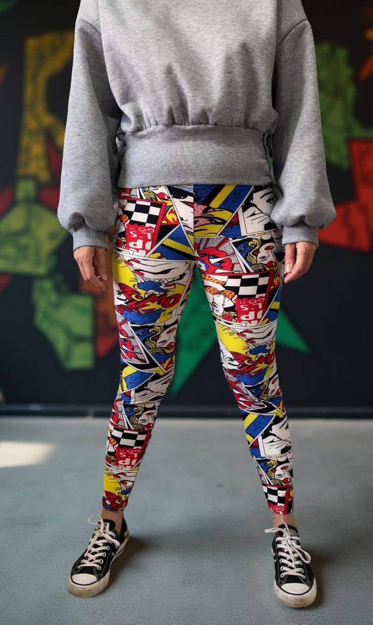 Pop Art Graphic High-Waisted Leggings - Front view of model wearing leggings with high waist and comic-inspired print