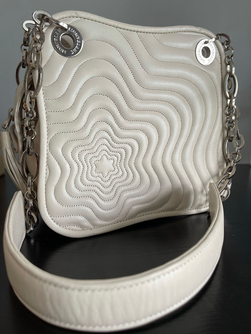 Side view of Montblanc Starisma bag showing structured shape and silver hardware