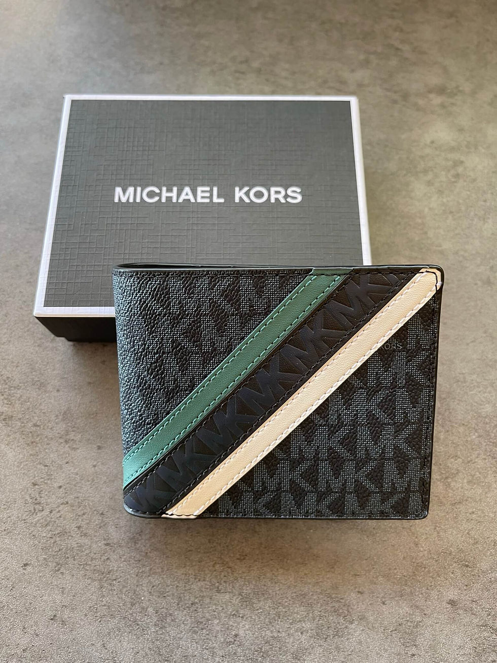 Michael Kors Embossed Logo Wallet – front view with teal and white diagonal stripes and embossed MK monogram, shown with box.