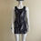 Thumbnail: Black and White Overlay Mini Dress – full front view on light backdrop, sleeveless with round neckline