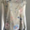 Thumbnail: Emery Rose Grey Batwing Button Blouse – front view with soft grey base, floral print, and relaxed drape