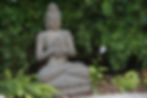 Meditierender Buddha in der Asiaecke