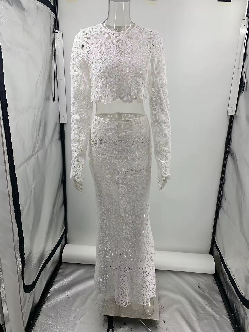 Thumbnail: White cut out long dress and bikini set on display in studio