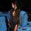 Thumbnail: Woman in black lace dress near blue car. Cut Out Long Dress And Bikini Set.
