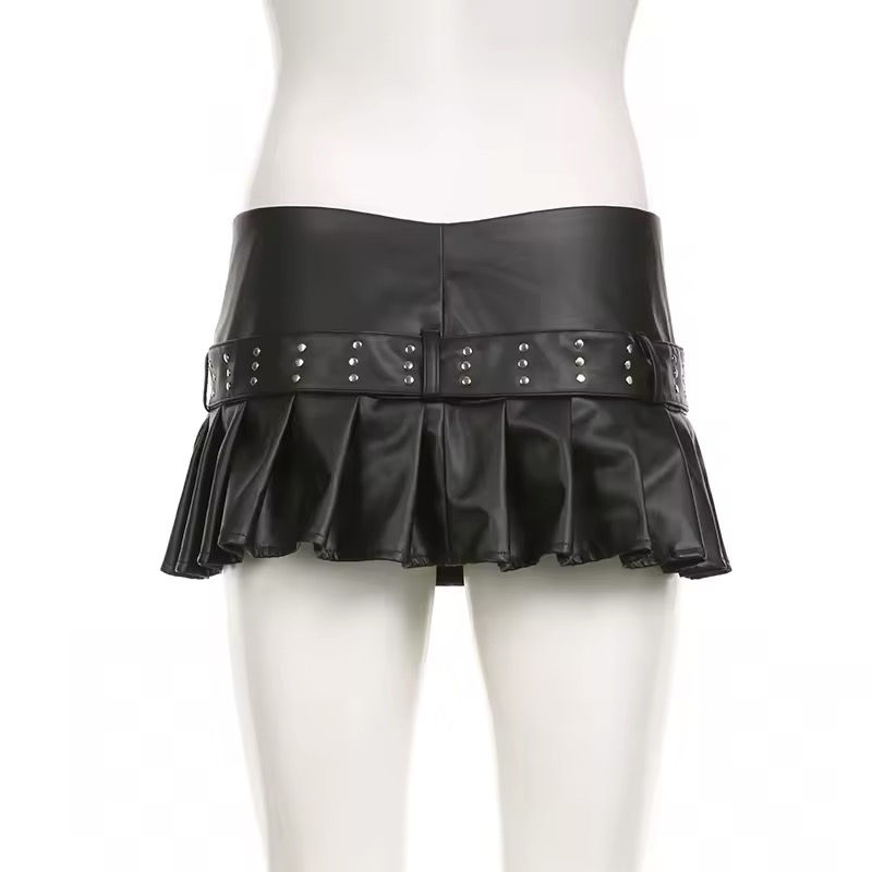 Thumbnail: Black leather pleated mini skirt with studded belt on a mannequin.