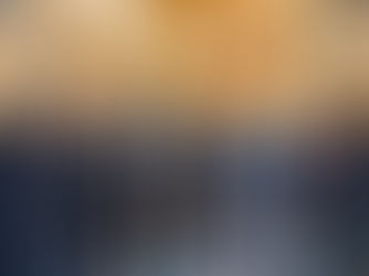 Group of Wisconsin robotics students in business attire posing with their robot and representatives in the Wisconsin State Capitol.