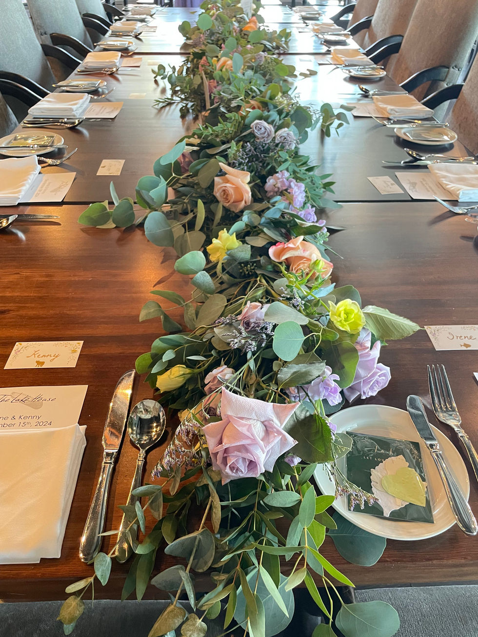 Elegant floral centerpiece adorns long table