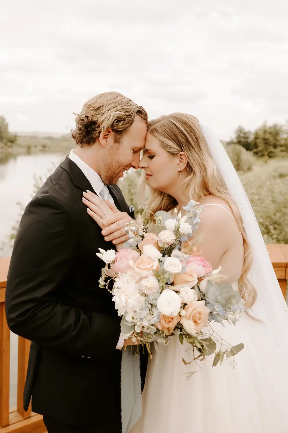 Romantic wedding couple embracing