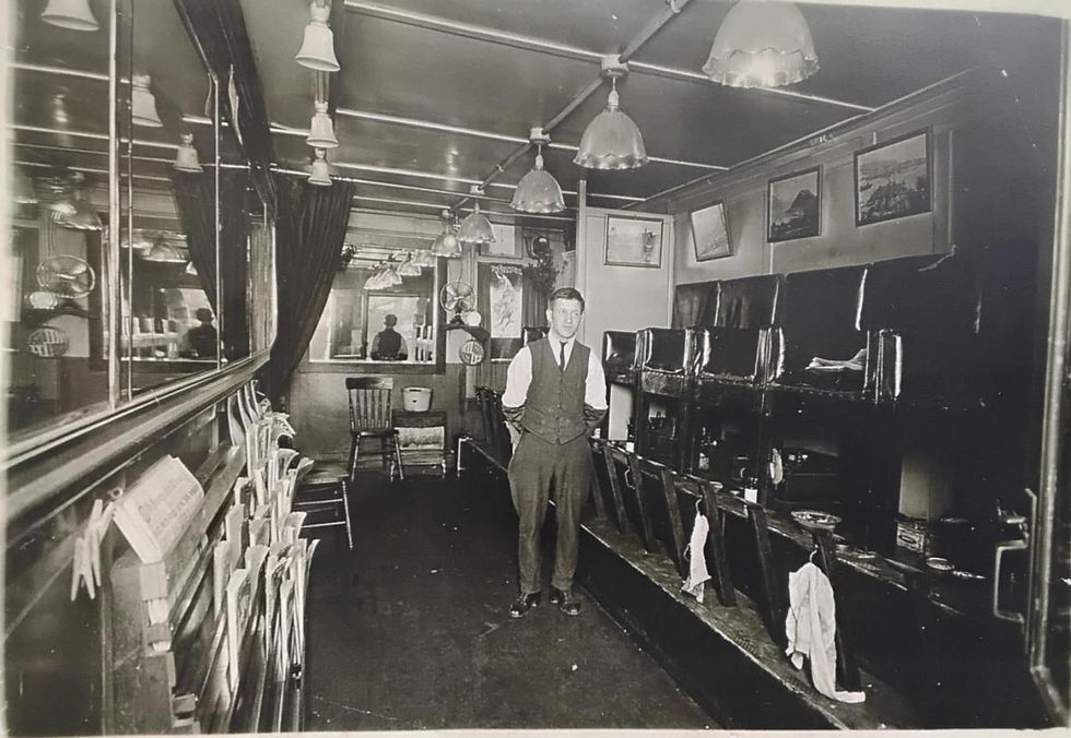 Man in vest in an old barbershop