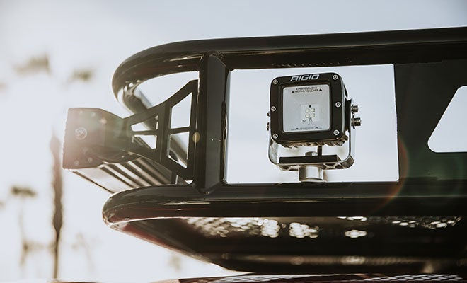 Black light bar mounted on truck roof rack